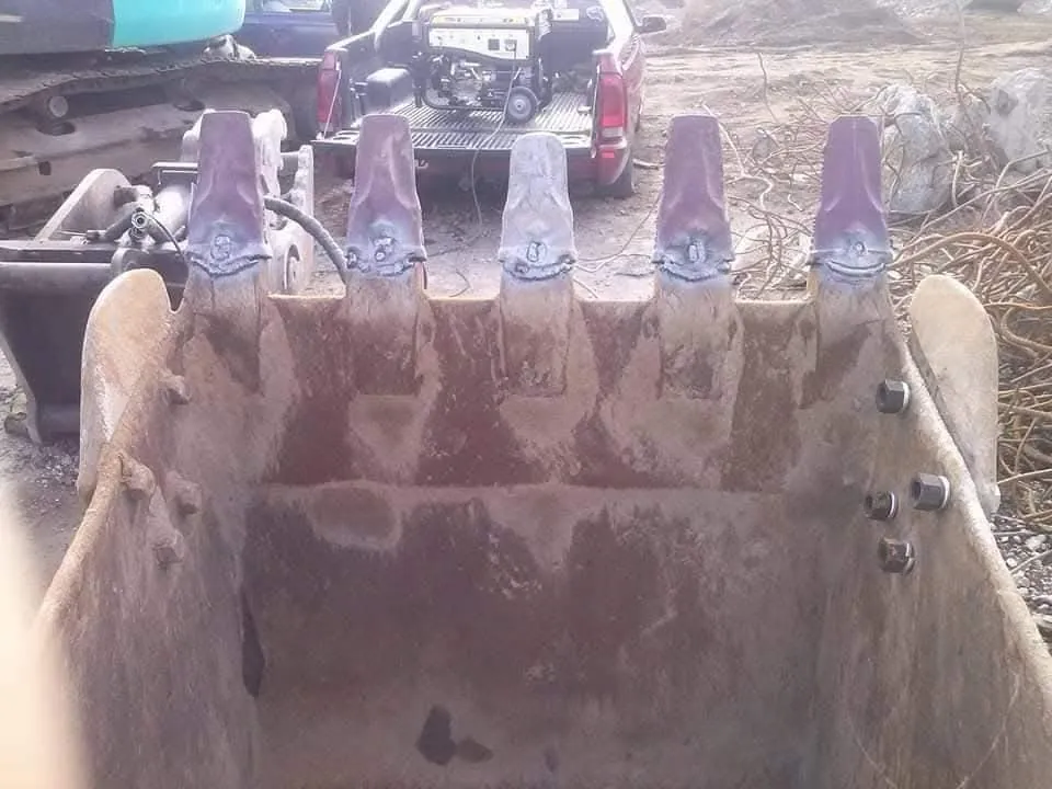 Excavator bucket rebuild with new teeth