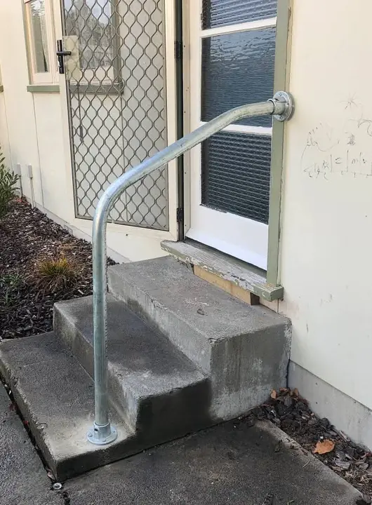 Galvanised step handrail at a home